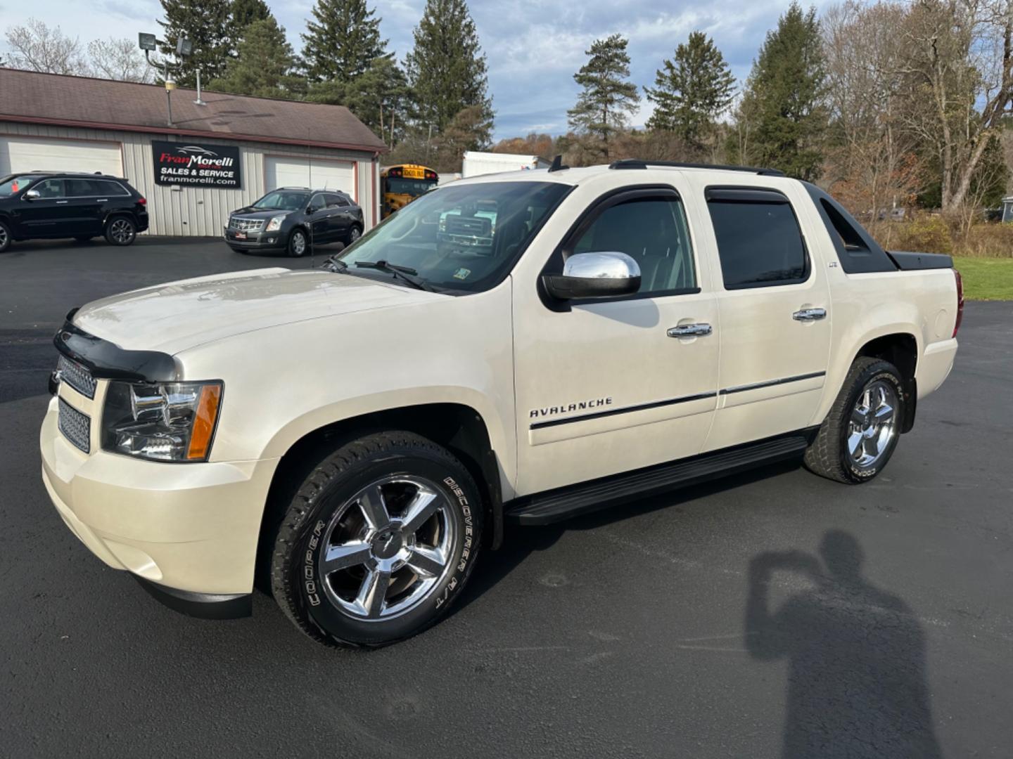 2011 White /BLACK Chevrolet Avalanche (3GNTKGE31BG) with an 8 engine, automatic transmission, located at 8464 Route 219, Brockway, PA, 15824, (814) 265-1330, 41.226871, -78.780518 - WOW...just traded in 2011 Chev Avalanche LTZ with leather, power/heated/cool seats, sunroof, DVD, hitch, and ONLY 64000 miles. Serviced and ready to go. Hard to find and we have the right one. - Photo#0